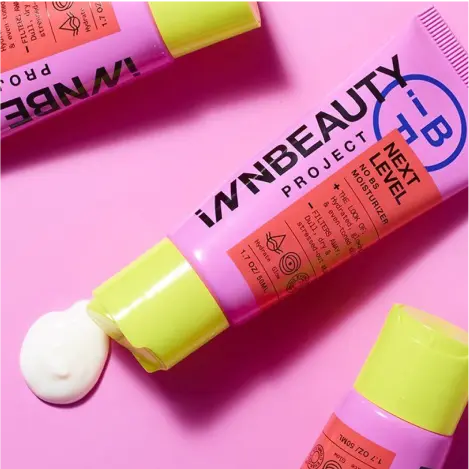 Picture of a brightly-colored pink and orange squeeze tube with yellow cap of Innbeauty product.