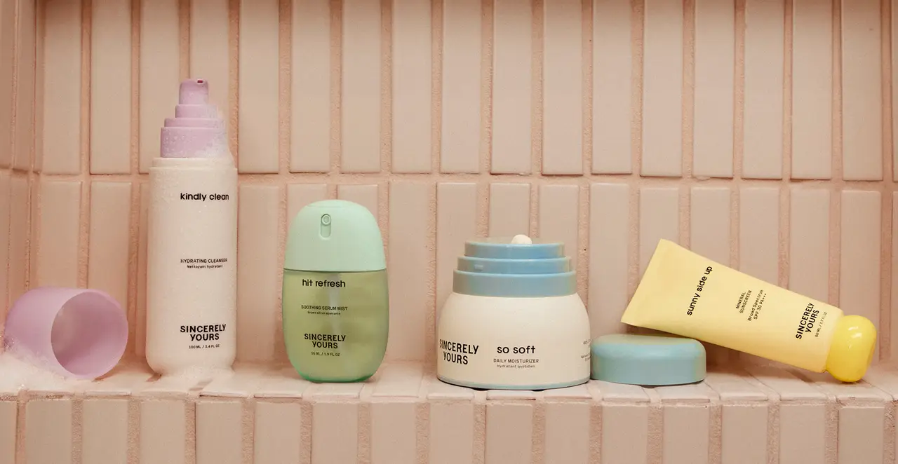 Four Sincerely Yours skincare products arranged on a tiled shelf